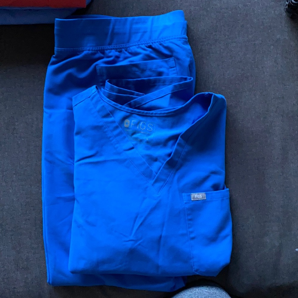 Both size XL. Royal blue. Single pocket top. Livingston style pant